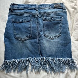 Boutique denim skirt with fringe distressing at the bottom size L used like new